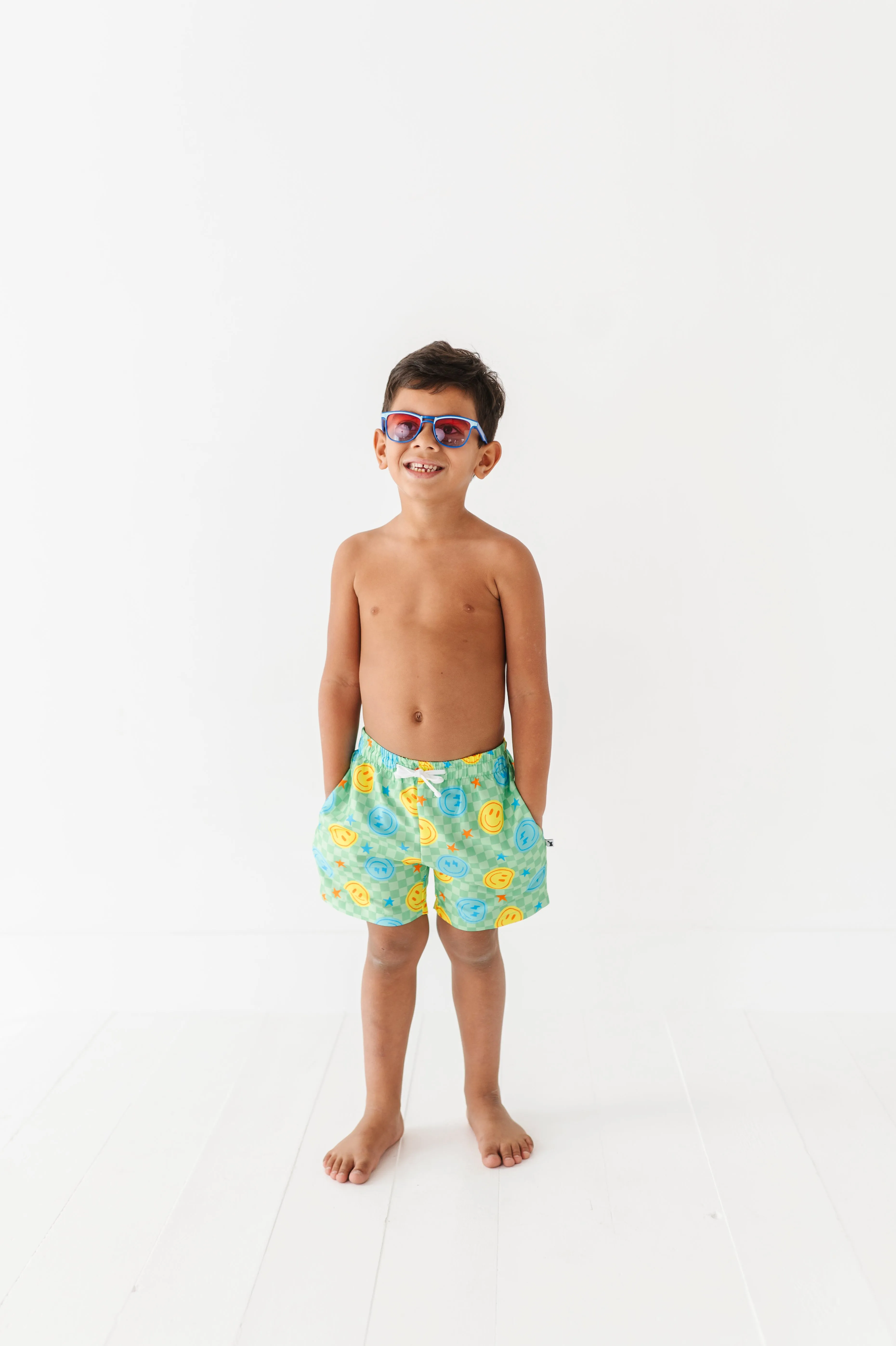 Electric Smiles Swim Trunks