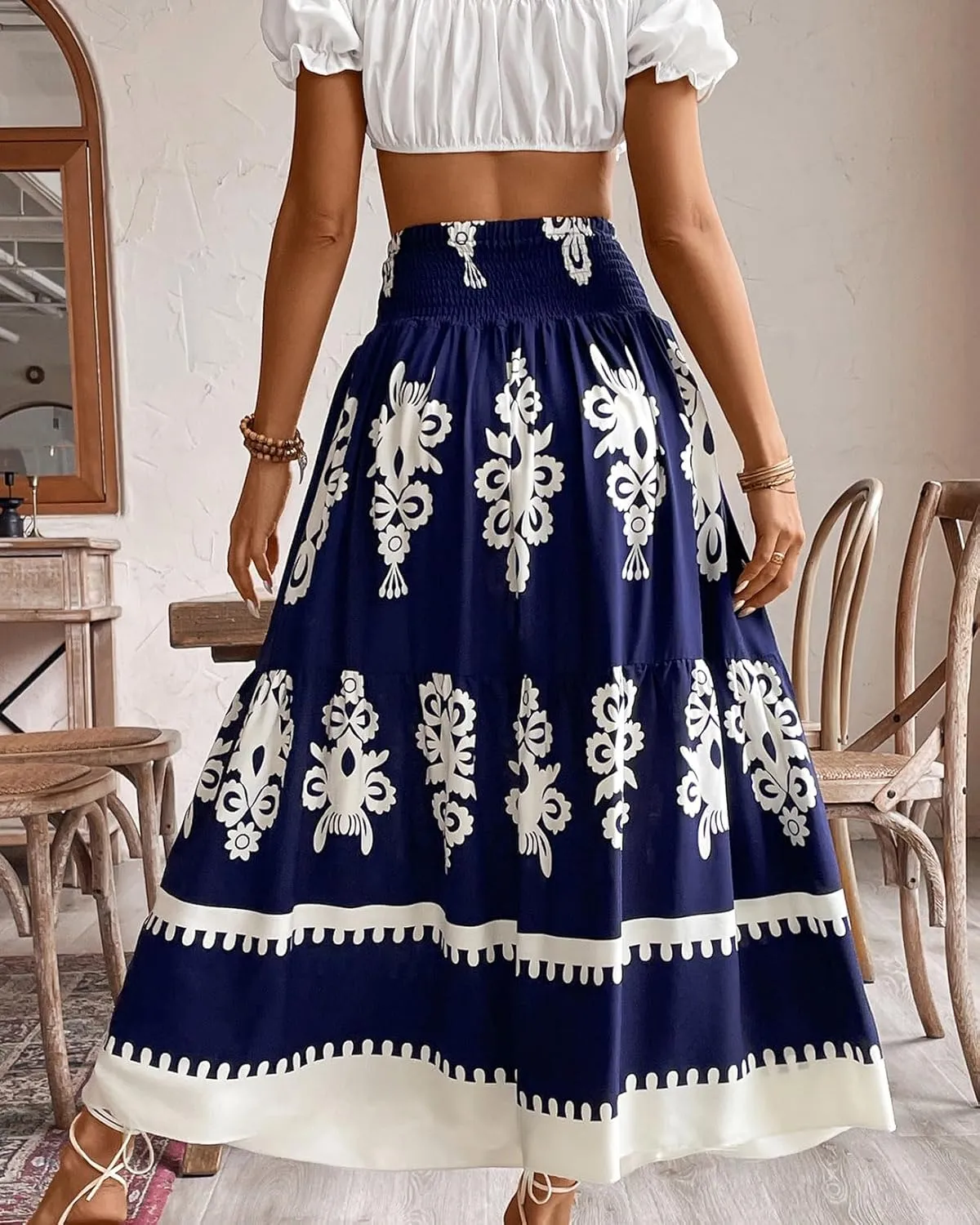 utcoco Women's 2025 Summer Beach Floral Print Maxi Skirts Elastic High Waist A Line Pleated Boho Flowy Long Skirt